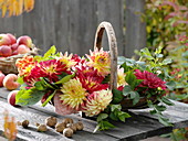 Spank basket with cut dahlias on wooden table