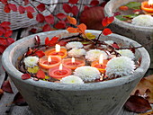 Floating candles and floating flowers of chrysanthemum