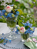 Small bouquets of Rose 'Eden Rose' and Myosotis