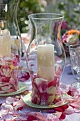 Table decoration with roses and lanterns