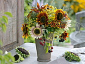 Late summer bouquet with Helianthus 'Autumn Time' (sunflower)