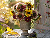 Bouquet made of helianthus (sunflower), dahlia, roses