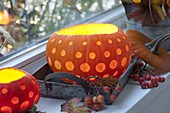 Decorative carved pumpkins (Cucurbita) as lanterns