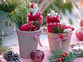 St. Nicholas socks stuffed with St. Nicholas chocolates in Terrracotta pots