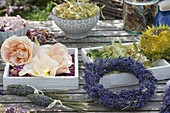 Herb table: pink (rose blossom), lavender (Lavandula) wreath