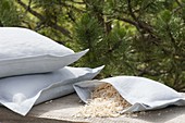 Stone pine pillows are cushions that are filled with stone pine chips