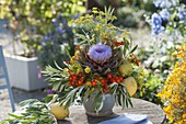 Unusual arrangement with artichoke flower (Cynara scolymus)