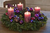 Advent wreath of mixed coniferous branches and Buxus
