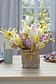Lush bouquet of Hyacinthus (hyacinth), Narcissus (narcissus)