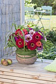 Late summer bouquet of zinnia and miscanthus
