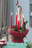 Hanging Advent wreath made of clay pot and driftwood