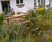 Wooden terrace built into the pond, seating places