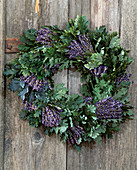 Door wreath made of lavender bouquet and oak leaves