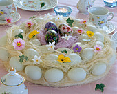 Painted eggs with flower motifs, viola (horned violet, primula)