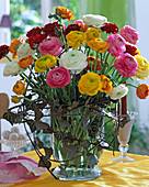 Colorful Ranunculus Bouquet in Glass Vase with Hedera (Ivy)