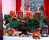 Jardiniere with Advent arrangement at the window