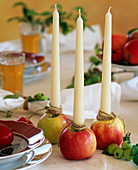 Malus (apples) as a candleholder