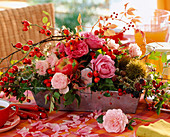 Rose arrangement in the metal basket