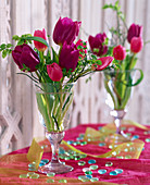 Tulipa (tulips and vaccinium) bouquet in wineglass