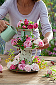 Homemade cake stand with rose petals