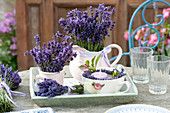 Lavandula (lavender) bouquet in jug and cup