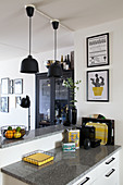 Black and yellow accessories on kitchen counter