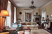 Antique furniture and chandelier in traditional living room