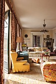 Sunshine falling into traditional living room with antique furnishings