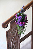 Posy of asters on banister