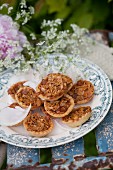 Almond tarts and chervil flowers on vintage-style plate