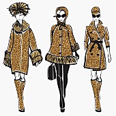 Three elegant fashion models side by side approaching camera wearing leopard print