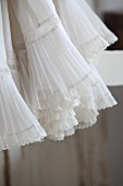Detail of ruffles and lace