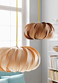 Two lampshades made from wooden veneers