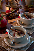 Apple tea with dried apple slices, star anise and cinnamon sticks