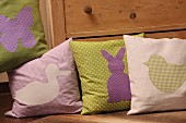 Hand-sewn scatter cushions with Easter motifs
