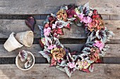 Vintage-style wreath of Rex begonia leaves and hydrangea flowers