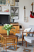 Nest of Scandinavian-style wooden tables in living room