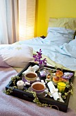 Gifts on breakfast tray on double bed