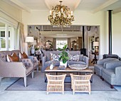Comfortable upholstered furniture in elegant open-plan lounge