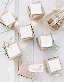 Small card boxes with white cards and ribbons