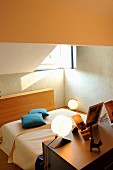 Spherical lamps in bedroom on sunken level