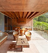 Modern loggia of architect-designed house in shades of brown
