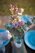Posy of roses and eucalyptus sprigs