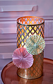Pink and green paper rosettes on gold, Oriental lantern