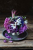 Purple arrangement of hydrangeas, Abyssinian sword-lilies and phylica