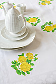 Tablecloth with iron-on floral motifs