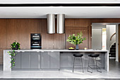 State-of-the-art kitchen with fitted wardrobes and island