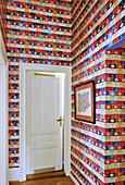 Colourful Penguin Library Wallpaper in hallway