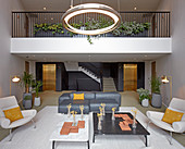 Designer furniture and gallery in modern living room