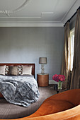 Elegant bedroom in gray and brown
